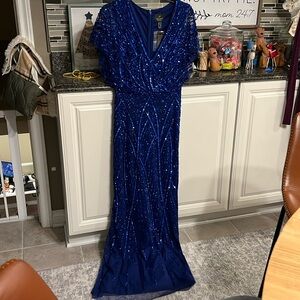 Sparkly and sequined blue short sleeve long dress